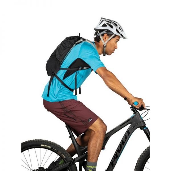 Man on a bike carrying Osprey Katari 7 Hydration Pack - Black